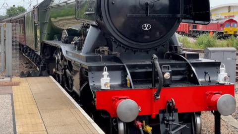 Video shows the locomotive travelling through the Norfolk countryside before pulling into Norwich.