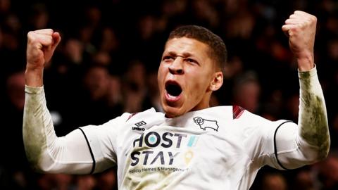 Dwight Gayle celebrates scoring for Derby