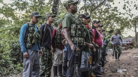 Farc guerrillas fall in during a review at their camp in the Transitional Standardization Zone in Pondores, La Guajira department, Colombia (05 April 2017)