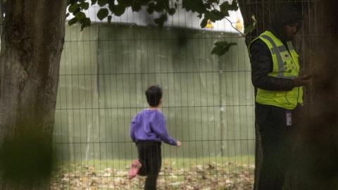 Anonymous shot of a child in the Manston holding facility in Kent