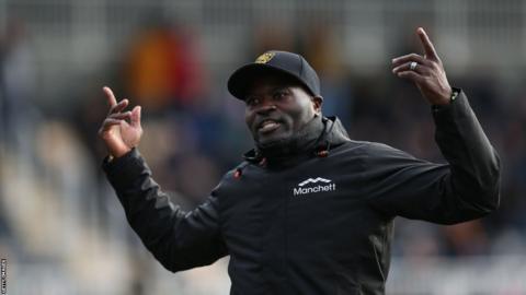 George Elokobi celebrates Maidstone United's FA Cup win