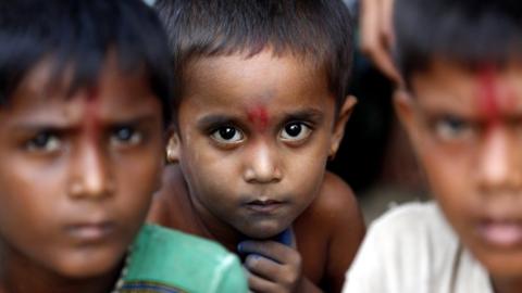 Hindu children gather at the temporary camp in Maungdaw township, Rakhine State, western Myanmar, 6 September 2017.