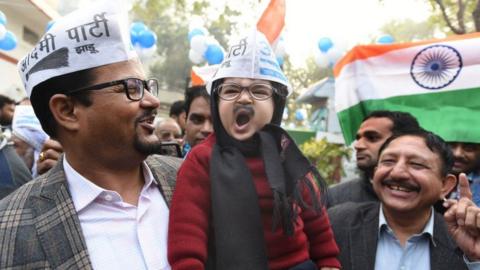 A child dressed up as AAP convener and Delhi Chief Minister Arvind Kejriwal during celebration at AAP headquarter, on February 11, 2020.