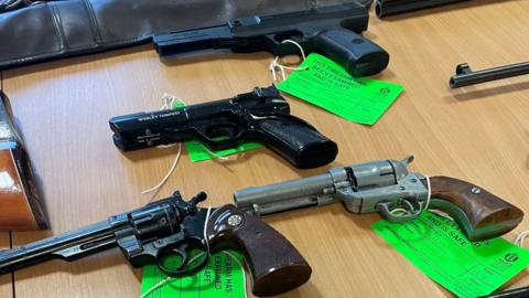 Firearms handed into police
