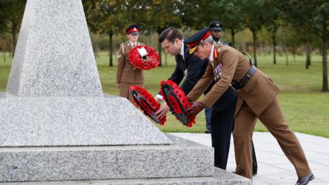 Armed Forces minister James Heappey and Major General Gerald Strickland lay wreaths during the service in Staffordshire