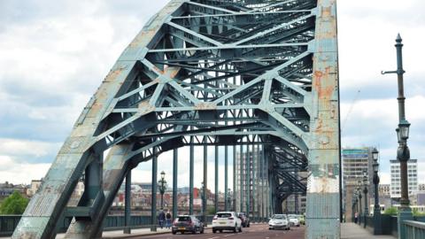 Peeling and rusting paintwork on Tyne Bridge