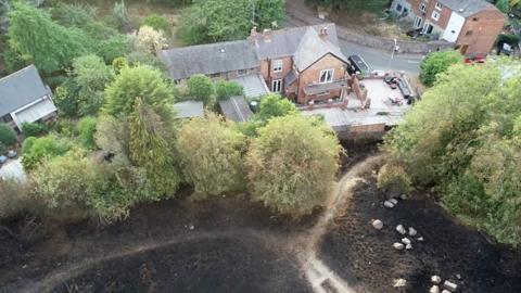 A still from the drone footage showing the extent of the fire