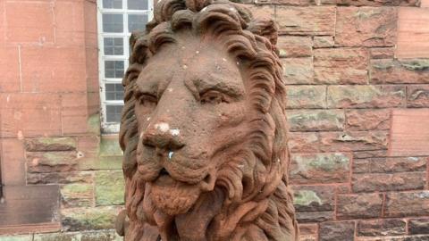 Lion head carving