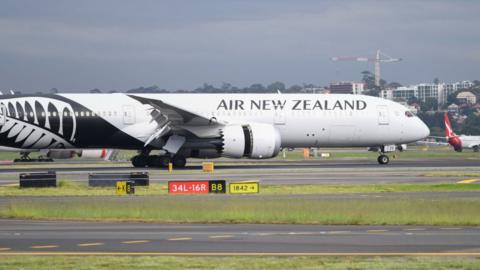 An Air New Zealand plane touching down at Sydney Airport in April 2020