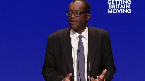 Chancellor Kwasi Kwarteng speaking to the Tory conference