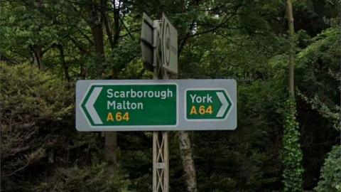 Signs for York and Scarborough on A64