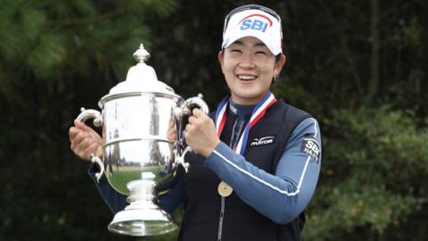 South Korea's A-Lim Kim holds up the trophy after winning the 2020 US Women's Open