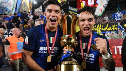 Joaquin Correa and Lautaro Martinez celebrate with the Coppa Italia trophy