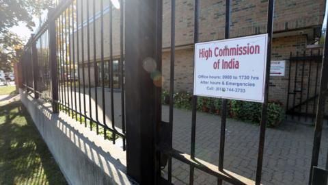 The front gate of High Commission of India is pictured on October 3, 2023 in Ottawa, Canada. Canada sought Tuesday to maintain its full diplomatic presence in India, after New Delhi reportedly ordered Ottawa to withdraw 40 diplomats in a dispute over the killing of a Sikh separatist.