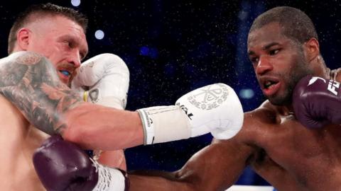 Oleksandr Usyk and Daniel Dubois exchange punches