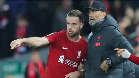 Liverpool boss Jurgen Klopp and former midfielder Jordan Henderson discuss tactics