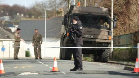 Police and bomb disposal experts at the scene near St Michael Avenue, Plymouth