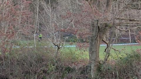 Police cordon in park