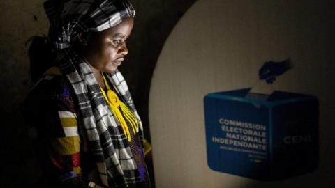 A voter marks her ballot paper in a booth at the Mavuno polling centre during the Presidential election in Goma, North Kivu province of the Democratic Republic of Congo December 20, 2023