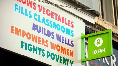 The logo in front of Oxfam charity shop in Glasgow