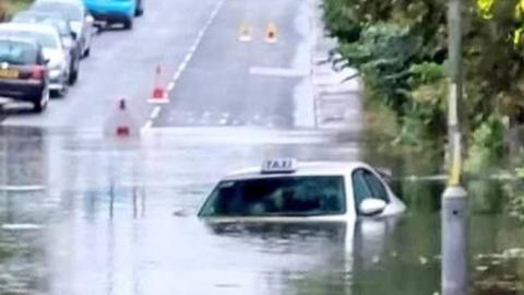 Taxi in floods