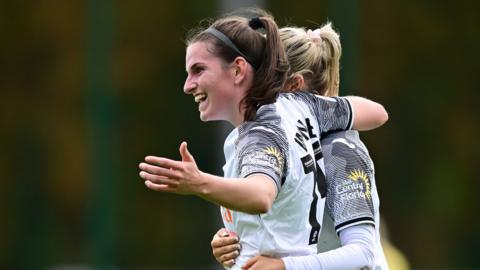 Swansea's Sammy Wynne celebrates after scoring her side's opening goal against Barry