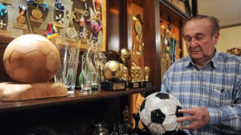 file photo on June 13, 2013 of former Conmebol president Nicolas Leoz showing trophies and medals at his residence in Asuncion on June 13, 2013.