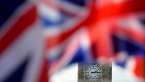 Union Flag flutters close to the Elizabeth Clock Tower