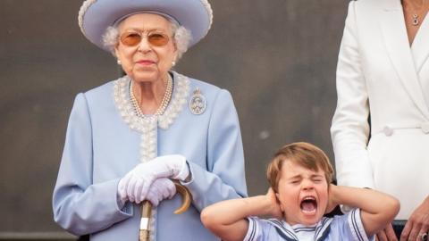 The Queen with Prince Louis and the walking stick