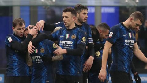 Stefano Sensi of Inter Milan (second from left) celebrates with team-mates