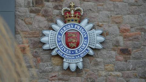 HMP La Moye, CCTV and barbed wire outside of prison fence
