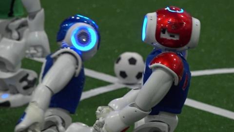 Robots playing football