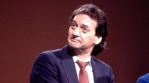 Joe Flaherty photographed onstage during the Second City's 25th anniversary show in Chicago, 1984