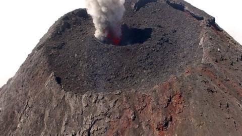 Violent volcanic eruptions in Guatemala are captured by drones for the first time.