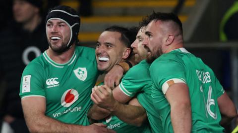 Ireland celebrate James Lowe's second try