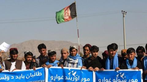 Afghan protesters march for peace and ceasefire in Kandahar province on 17 January 2019