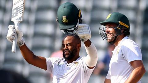 South Africa's Temba Bavuma celebrates reaching a century with Wiaan Mulder in the second Test against West Indies in March 2023