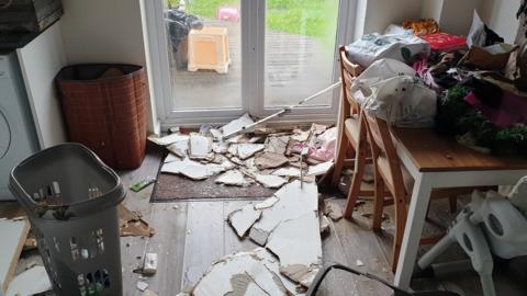 Rubble on the floor of the house