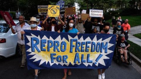 Abortion rights activists march to the house of US Supreme Court Justice Brett Kavanaugh