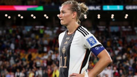 Alexandra Popp reacts to Germany's exit from the World Cup
