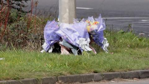 Flowers were laid near the scene of the accident