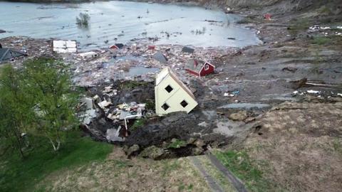 House upside down in the sea