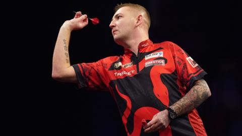 Nathan Aspinall during the Premier League Darts event in Newcastle