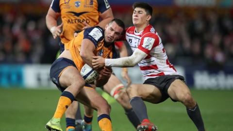 Gloucester Rugby's Louis Rees Zammit in action with Montpellier's Henry Immelman