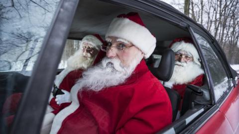 Santas in a car