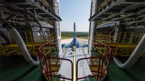 A Soyuz-2.1b rocket booster with a Fregat upper stage and satellites of British firm OneWeb is installed on a launchpad at the Vostochny Cosmodrome in Amur Region, Russia.