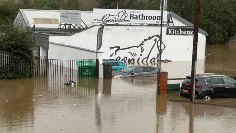 The exterior of Leonide Interiors after the flooding