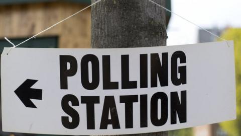 File photo of a sign indicating a polling station.
