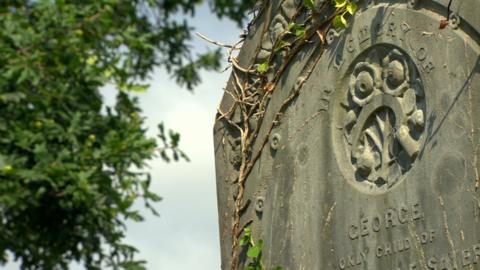 The headstone of 14-year-old George Sayers