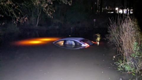 Car stuck in deep water in Essex